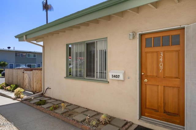 3407 Rexford St, Ventura, CA 93003 - doorway to property featuring stucco siding
