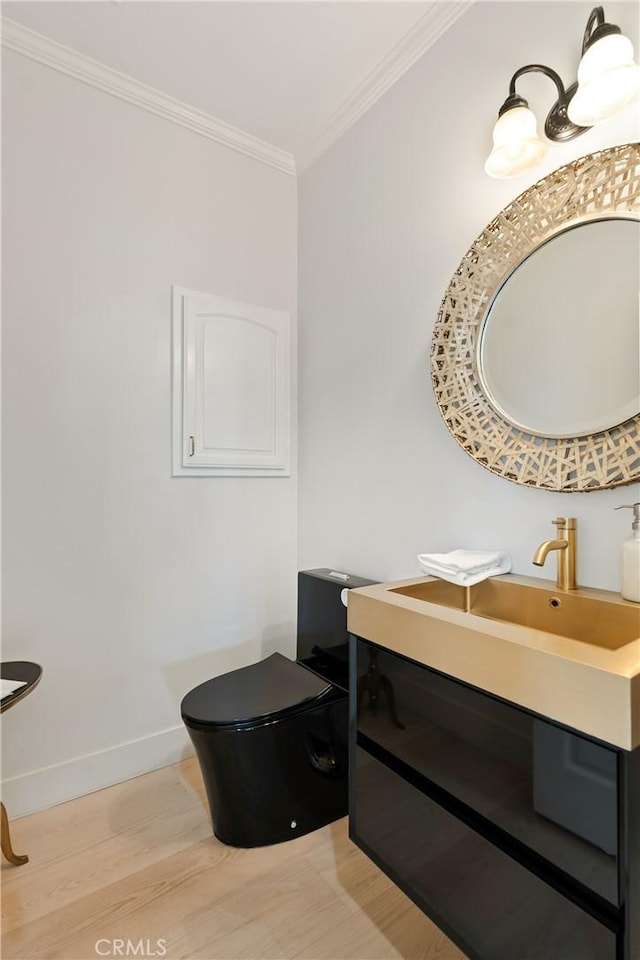 3610 Monserate Hill Ct, Fallbrook, CA 92028 - half bathroom featuring wood finished floors, ornamental molding, baseboards, and vanity