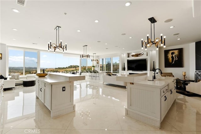 3610 Monserate Hill Ct, Fallbrook, CA 92028 - kitchen featuring open floor plan, a large island, a chandelier, light countertops, and recessed lighting