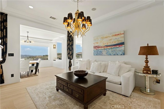 3610 Monserate Hill Ct, Fallbrook, CA 92028 - living area featuring a chandelier, wood finished floors, crown molding, and recessed lighting