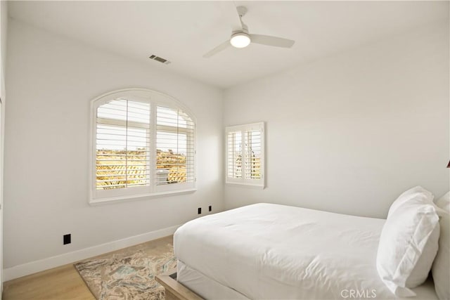 3610 Monserate Hill Ct, Fallbrook, CA 92028 - bedroom with baseboards, wood finished floors, and a ceiling fan