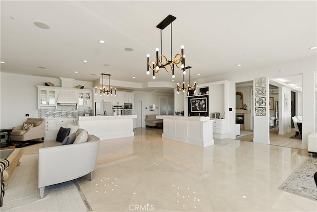 3610 Monserate Hill Ct, Fallbrook, CA 92028 - living room with a chandelier and recessed lighting