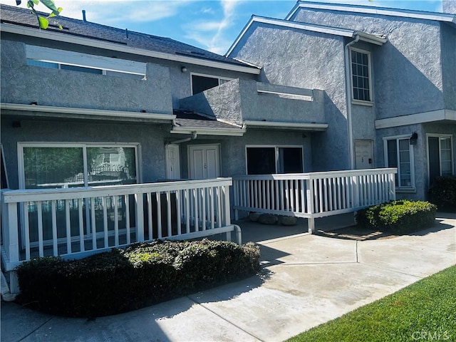 168 W Walnut Ave Unit C, Rialto, CA 92376 - view of front of home with stucco siding