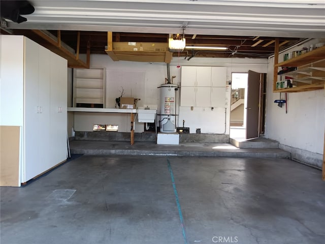 18 Goldenbush, Irvine, CA 92604 - garage with water heater and a garage door opener