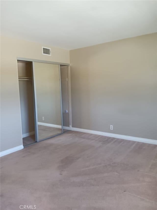 18 Goldenbush, Irvine, CA 92604 - unfurnished bedroom featuring carpet flooring and a closet
