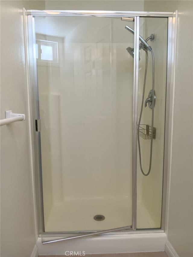 18 Goldenbush, Irvine, CA 92604 - bathroom with a shower stall and baseboards