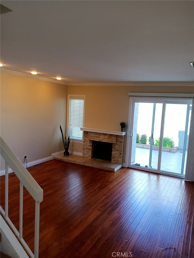 18 Goldenbush, Irvine, CA 92604 - unfurnished living room featuring dark wood-style flooring, a fireplace, and ornamental molding