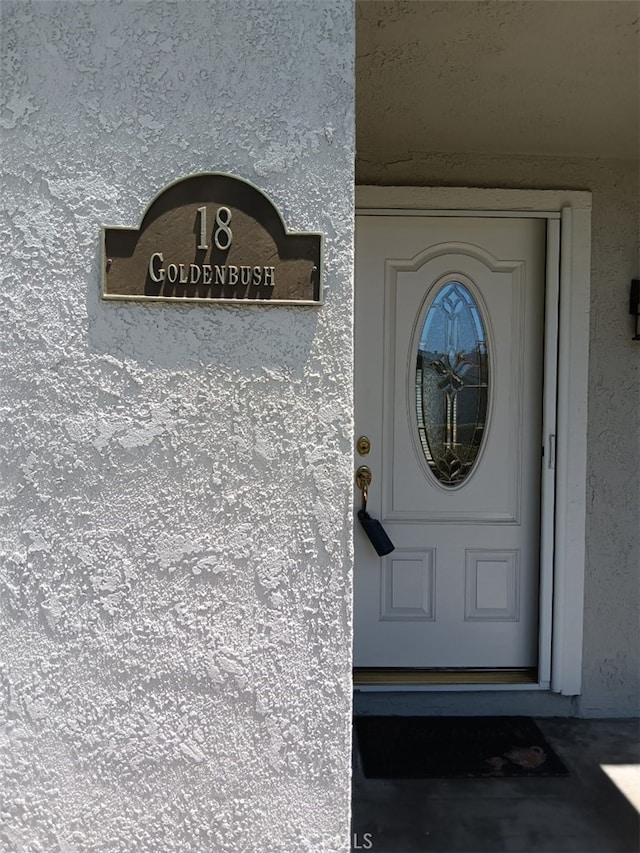 18 Goldenbush, Irvine, CA 92604 - entrance to property featuring stucco siding