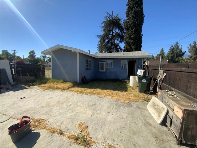 215 W 23rd St, San Bernardino, CA 92405 - back of property featuring stucco siding