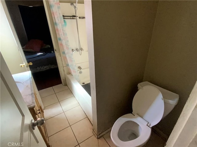 215 W 23rd St, San Bernardino, CA 92405 - bathroom featuring shower / bath combo and tile patterned floors