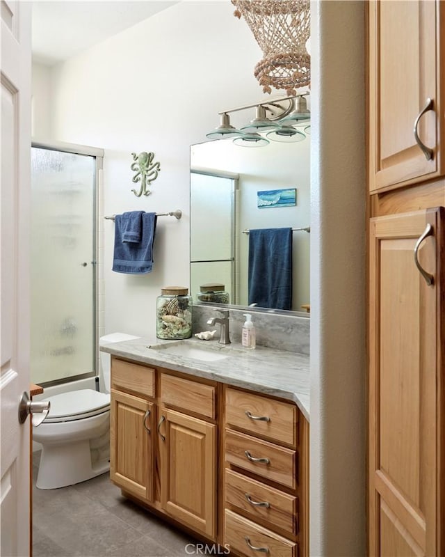 1417 23rd St, Oceano, CA 93445 - full bathroom with vanity, toilet, tile patterned floors, and enclosed tub / shower combo
