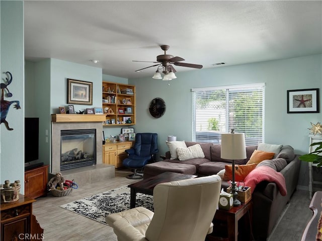 1417 23rd St, Oceano, CA 93445 - living area with a ceiling fan, a fireplace, and light wood finished floors