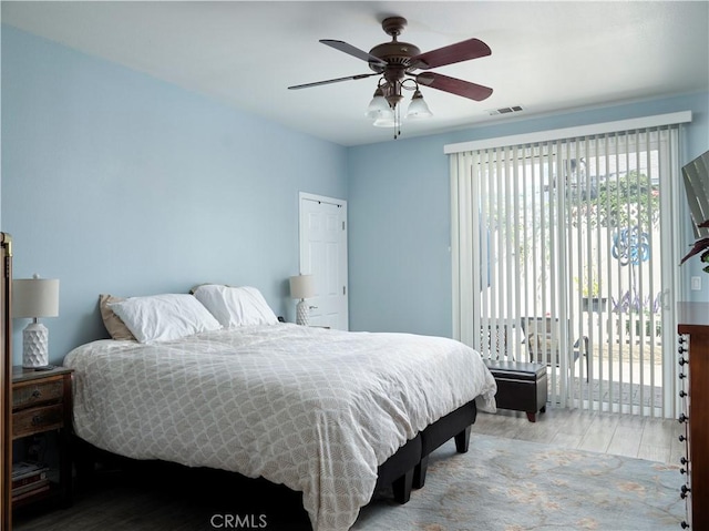 1417 23rd St, Oceano, CA 93445 - bedroom with wood finished floors, access to exterior, and a ceiling fan