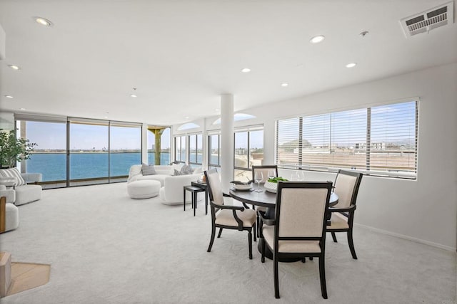 3868 Riviera Dr Unit 4A, San Diego, CA 92109 - dining room with light colored carpet, recessed lighting, and a water view