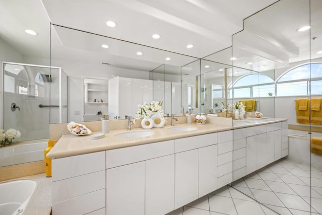 3868 Riviera Dr Unit 4A, San Diego, CA 92109 - bathroom with a stall shower, double vanity, a garden tub, recessed lighting, and tile patterned flooring