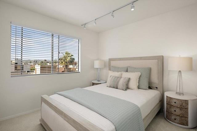 3868 Riviera Dr Unit 4A, San Diego, CA 92109 - carpeted bedroom with track lighting and baseboards