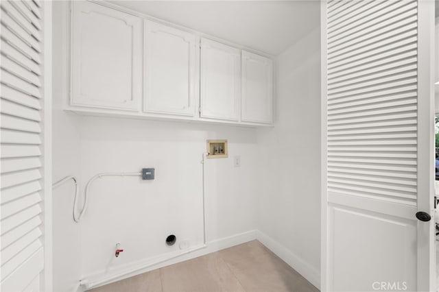 2402 Pepperdale Dr, Rowland Heights, CA 91748 - laundry room featuring cabinet space, gas dryer hookup, hookup for a washing machine, and baseboards