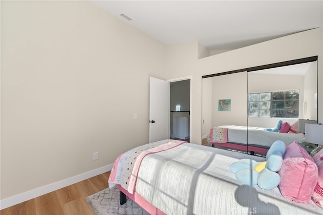 2402 Pepperdale Dr, Rowland Heights, CA 91748 - bedroom with wood finished floors, a closet, and baseboards