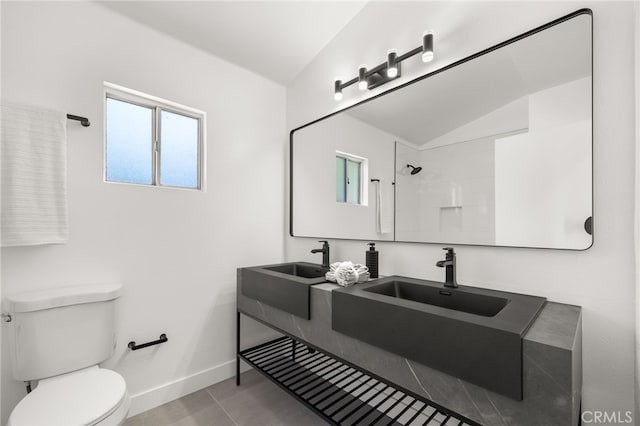 2402 Pepperdale Dr, Rowland Heights, CA 91748 - full bathroom featuring toilet, baseboards, double vanity, and lofted ceiling