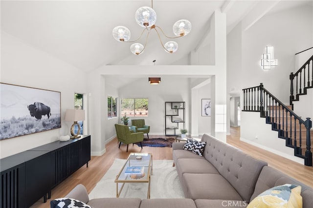 2402 Pepperdale Dr, Rowland Heights, CA 91748 - living room featuring light wood finished floors, stairway, high vaulted ceiling, a chandelier, and baseboards