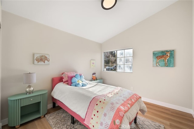 2402 Pepperdale Dr, Rowland Heights, CA 91748 - bedroom with wood finished floors, vaulted ceiling, and baseboards