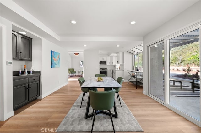 2402 Pepperdale Dr, Rowland Heights, CA 91748 - dining area featuring recessed lighting, light wood-style floors, and baseboards