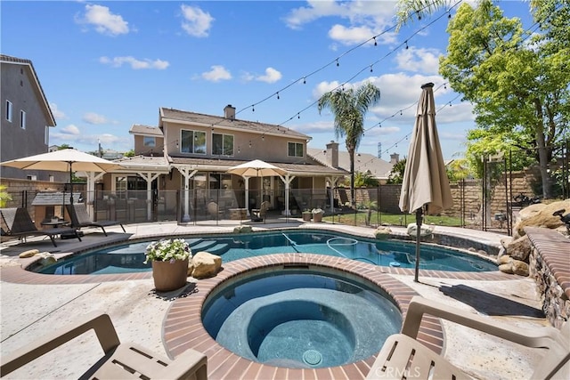 22011 Iron Horse Pl, Saugus, CA 91390 - view of pool featuring a patio area and a pool with connected hot tub