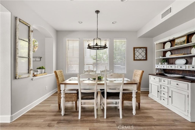 22011 Iron Horse Pl, Saugus, CA 91390 - dining area featuring a chandelier, light wood-style flooring, baseboards, and recessed lighting