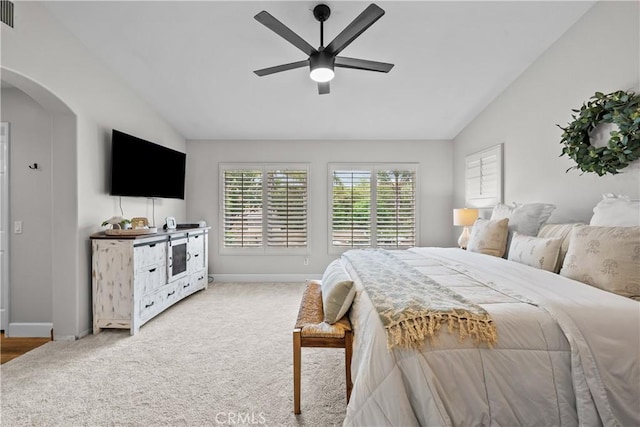 22011 Iron Horse Pl, Saugus, CA 91390 - bedroom with vaulted ceiling, arched walkways, baseboards, carpet flooring, and ceiling fan