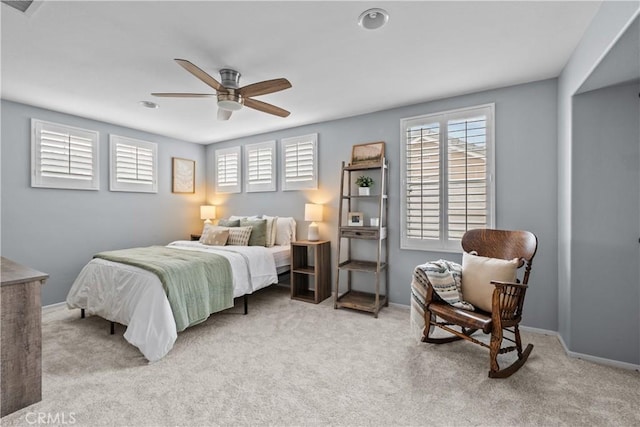 22011 Iron Horse Pl, Saugus, CA 91390 - bedroom with multiple windows, light colored carpet, a ceiling fan, and baseboards