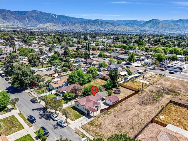 2513 Genevieve St, San Bernardino, CA 92405 - aerial perspective of suburban area featuring a mountain backdrop