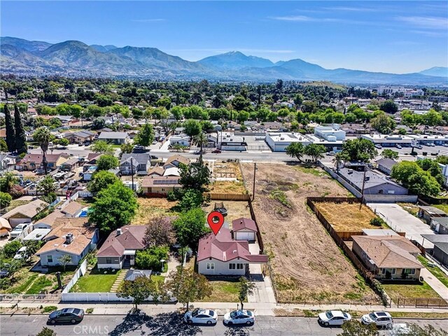 2513 Genevieve St, San Bernardino, CA 92405 - aerial view of residential area featuring a mountainous background