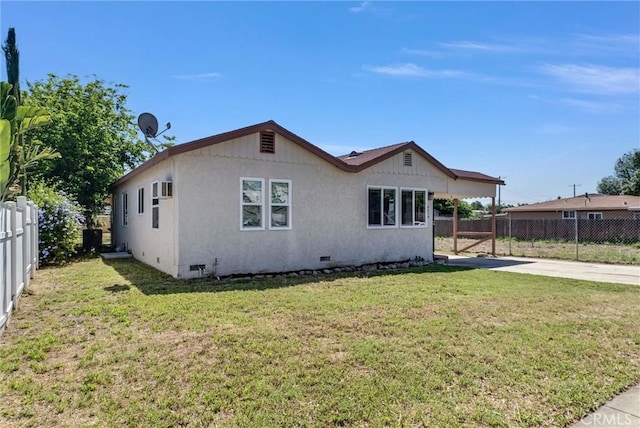 2513 Genevieve St, San Bernardino, CA 92405 - view of property exterior with crawl space, driveway, and stucco siding