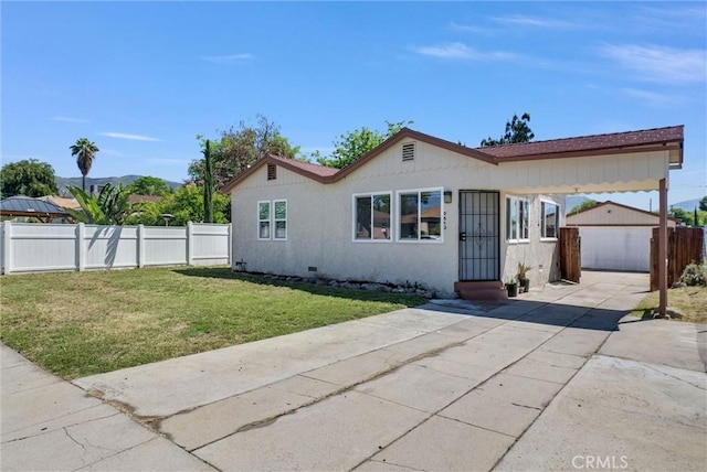 2513 Genevieve St, San Bernardino, CA 92405 - view of front of home featuring an outdoor structure, concrete driveway, a garage, and entry steps