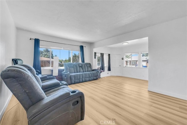 2513 Genevieve St, San Bernardino, CA 92405 - living room featuring wood finished floors and baseboards