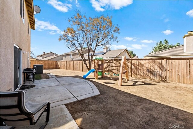 3260 Ivy Ct, Perris, CA 92571 - fenced backyard with a patio and central AC