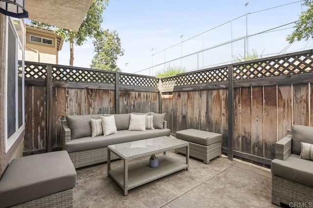 11372 Via Rancho San Diego Unit B, El Cajon, CA 92019 - fenced backyard with an outdoor living space and a patio