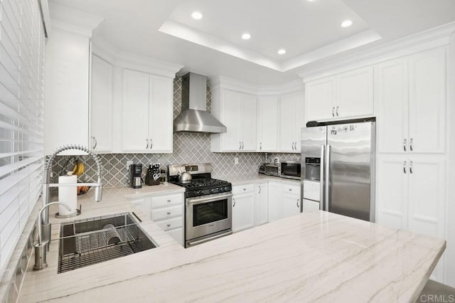 11372 Via Rancho San Diego Unit B, El Cajon, CA 92019 - kitchen featuring stainless steel appliances, wall chimney range hood, backsplash, recessed lighting, and light stone counters