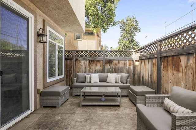 11372 Via Rancho San Diego Unit B, El Cajon, CA 92019 - fenced backyard featuring an outdoor living space and a patio area
