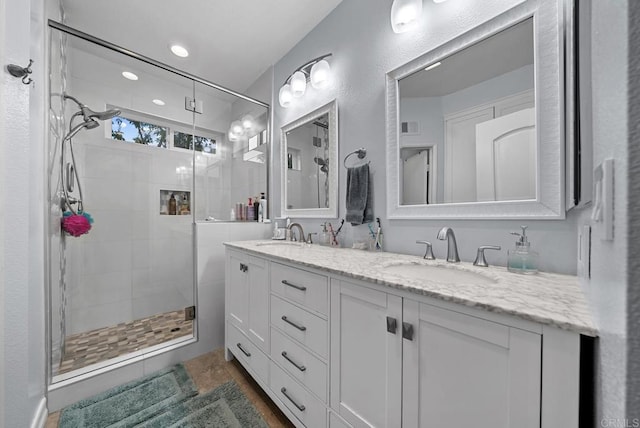 11372 Via Rancho San Diego Unit B, El Cajon, CA 92019 - full bathroom featuring a shower stall and double vanity
