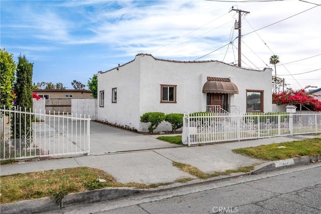 216 E El Segundo Blvd, Los Angeles, CA 90061 - mediterranean / spanish house featuring stucco siding