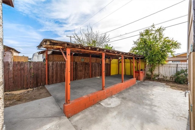 216 E El Segundo Blvd, Los Angeles, CA 90061 - fenced backyard featuring a patio