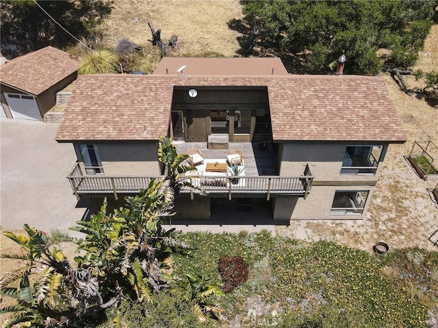 1635 Bee Canyon Rd, Arroyo Grande, CA 93420 - rear view of house featuring roof with shingles, stucco siding, and a balcony
