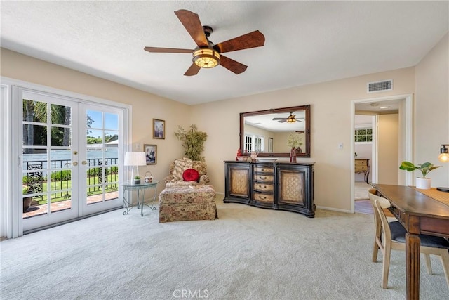 1113 Hollydale Dr, Fullerton, CA 92831 - living area featuring french doors, a ceiling fan, carpet floors, and baseboards