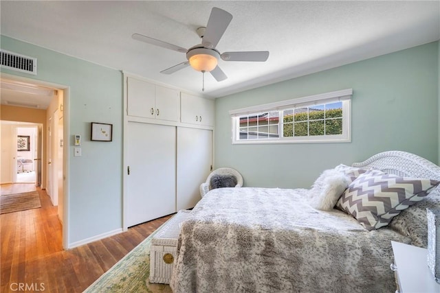 1113 Hollydale Dr, Fullerton, CA 92831 - bedroom featuring wood finished floors, a closet, baseboards, and ceiling fan