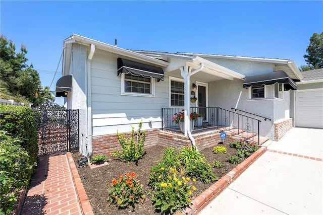 1113 Hollydale Dr, Fullerton, CA 92831 - view of front of house featuring driveway and covered porch