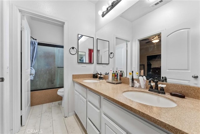 4803 Hawk Ridge Ave, Fontana, CA 92336 - full bathroom with toilet, shower / bath combination with glass door, double vanity, and ceiling fan