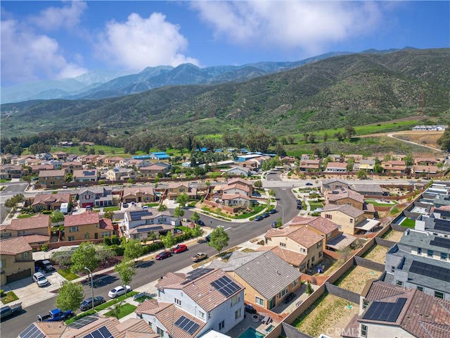 4803 Hawk Ridge Ave, Fontana, CA 92336 - aerial view of residential area with a mountain backdrop