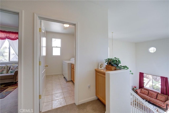 932 Provance Ave, Santa Maria, CA 93458 - corridor featuring washer / clothes dryer, baseboards, and light tile patterned floors