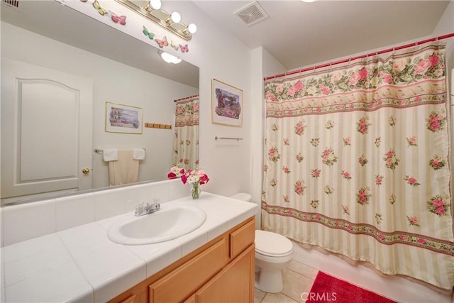 932 Provance Ave, Santa Maria, CA 93458 - bathroom featuring toilet, tile patterned floors, vanity, and shower / tub combo